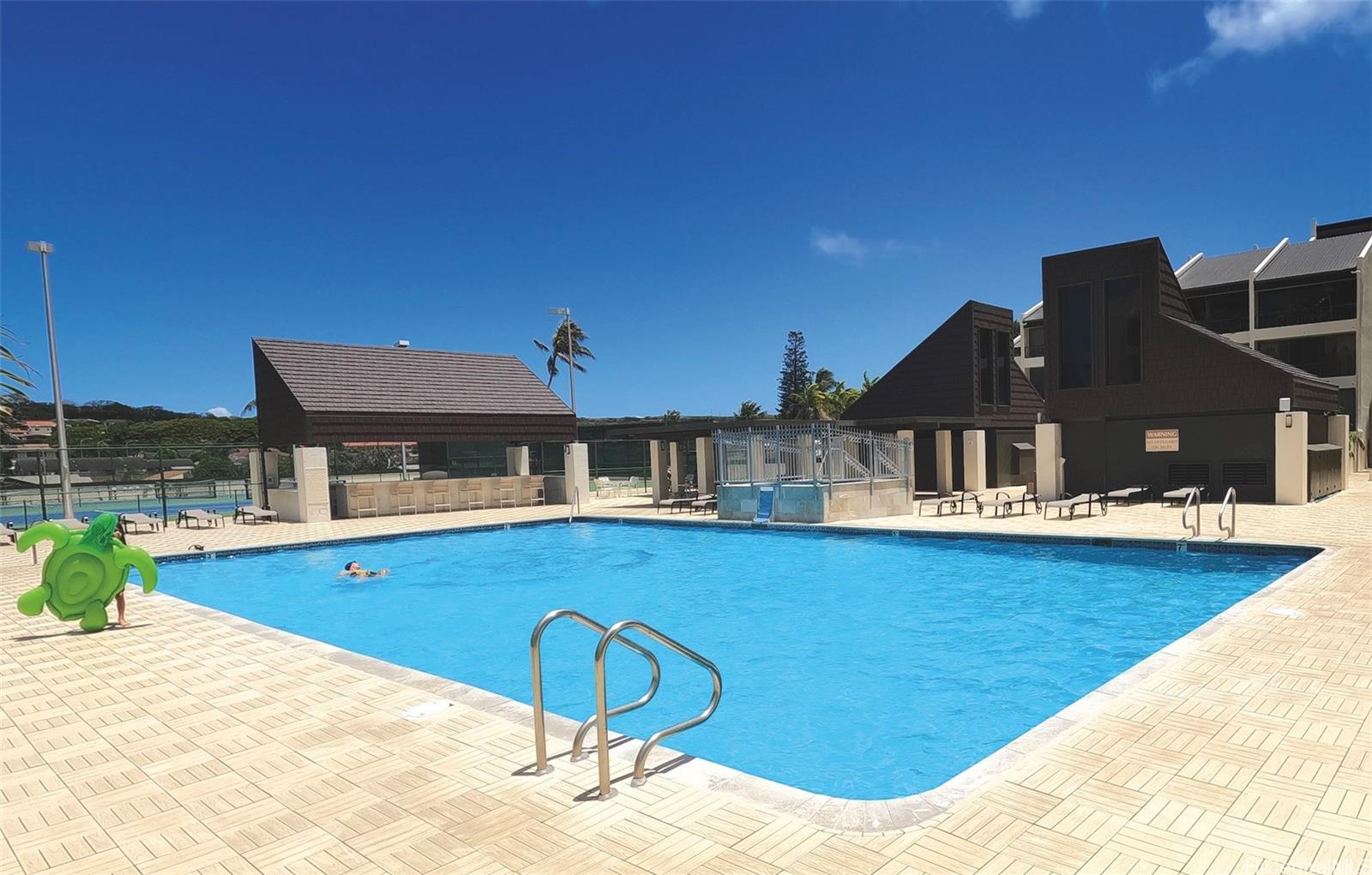 500 Lunalilo Home Road, Unit 26D Honolulu, HI 96825 - Photo 20 of 22 The common area includes a large pool, hot tub, barbecues, saunas, and gym
