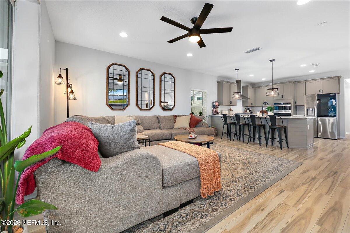 653 Ivory Palm Road Orange Park, FL 32073 - Photo 8 of 33 08-Family Room to Kitchen