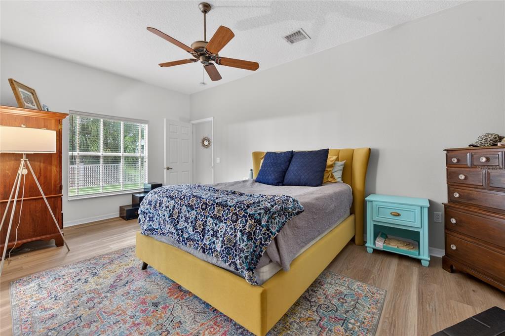 339 Mariners Gate Drive Edgewater, FL 32141 - Photo 14 of 41 a bedroom with a bed and next to a window
