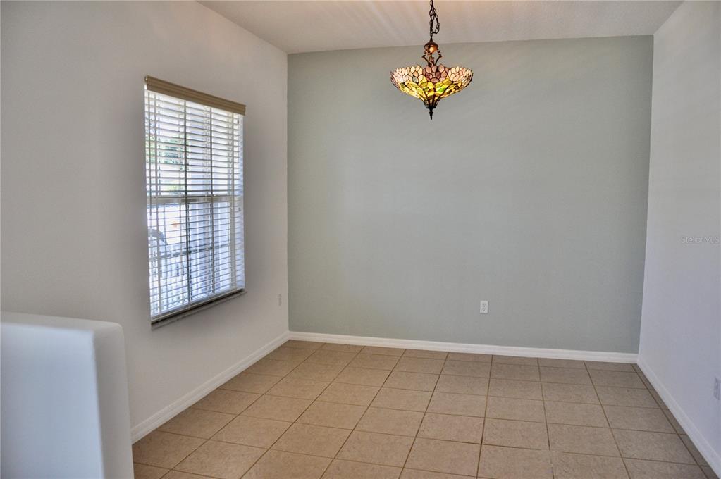 339 Mariners Gate Drive Edgewater, FL 32141 - Photo 17 of 41 a view of an empty room with a window