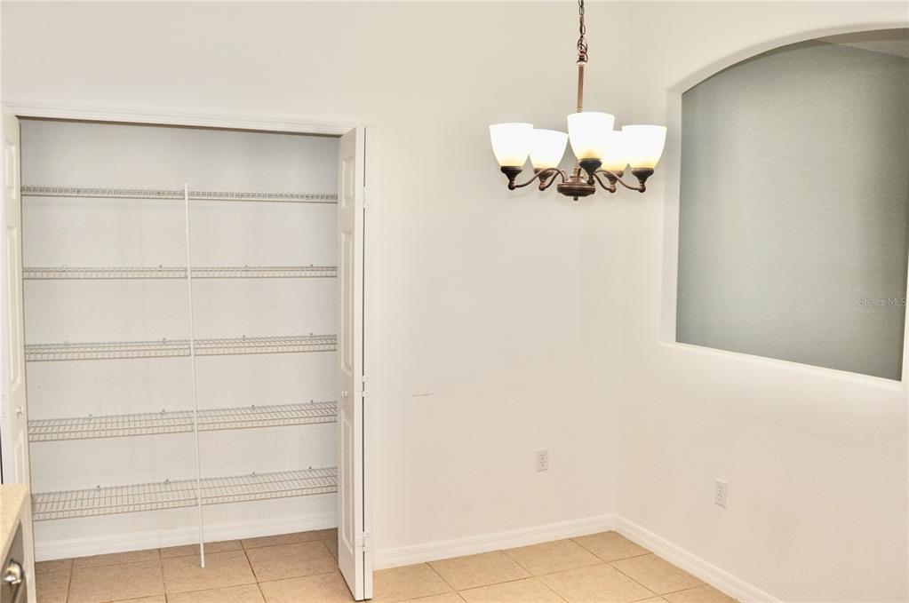 339 Mariners Gate Drive Edgewater, FL 32141 - Photo 21 of 41 a view of a refrigerator in a room