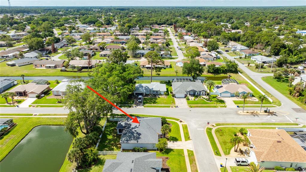 339 Mariners Gate Drive Edgewater, FL 32141 - Photo 29 of 41 an aerial view of residential houses with outdoor space and swimming pool