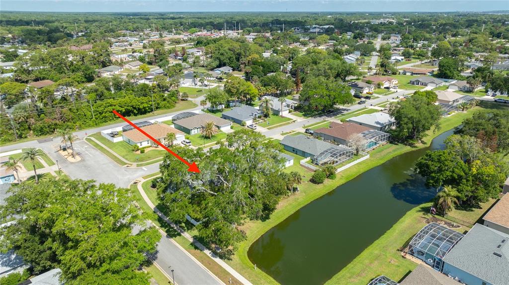 339 Mariners Gate Drive Edgewater, FL 32141 - Photo 32 of 41 an aerial view of residential houses with outdoor space
