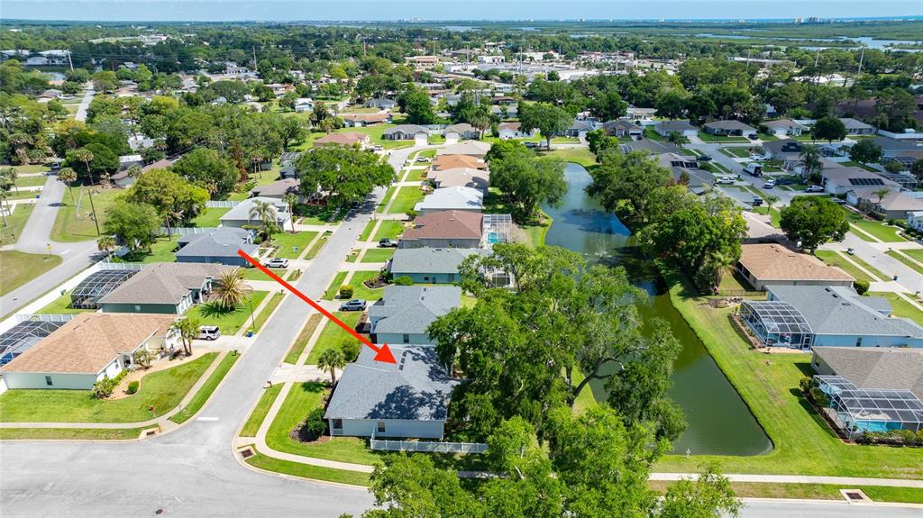 339 Mariners Gate Drive Edgewater, FL 32141 - Photo 33 of 41 an aerial view of residential houses with outdoor space and river