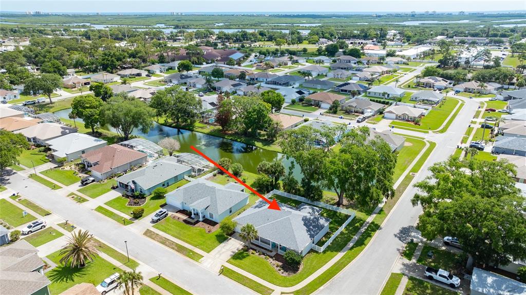339 Mariners Gate Drive Edgewater, FL 32141 - Photo 35 of 41 an aerial view of residential houses with outdoor space