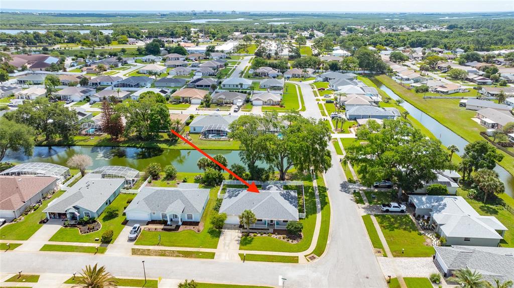339 Mariners Gate Drive Edgewater, FL 32141 - Photo 36 of 41 an aerial view of residential houses with outdoor space