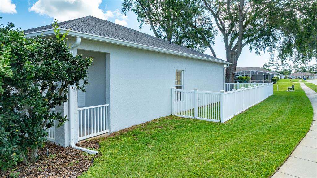 339 Mariners Gate Drive Edgewater, FL 32141 - Photo 38 of 41 a view of a house with backyard and a tree
