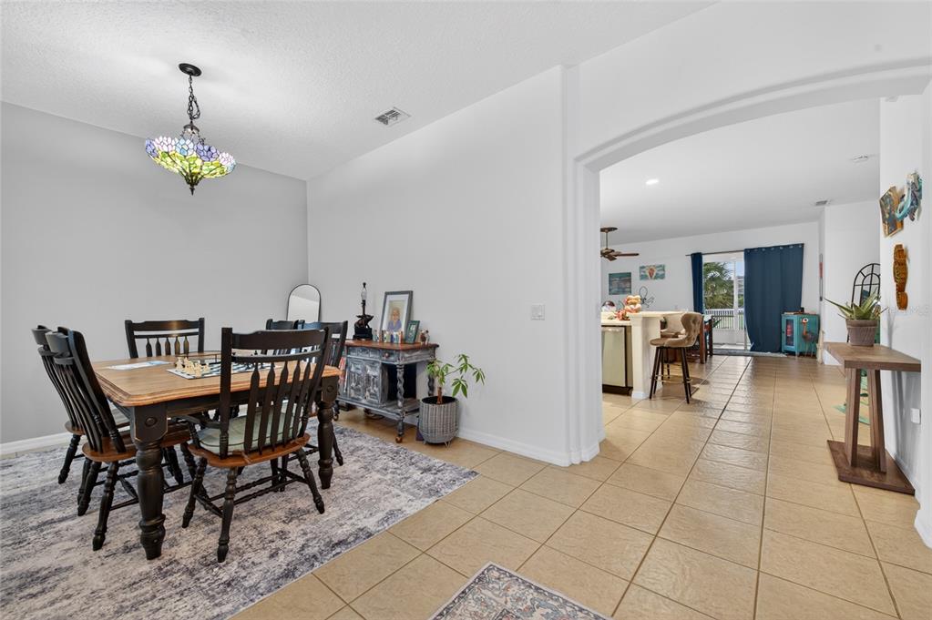 339 Mariners Gate Drive Edgewater, FL 32141 - Photo 10 of 41 a view of a dining room with furniture