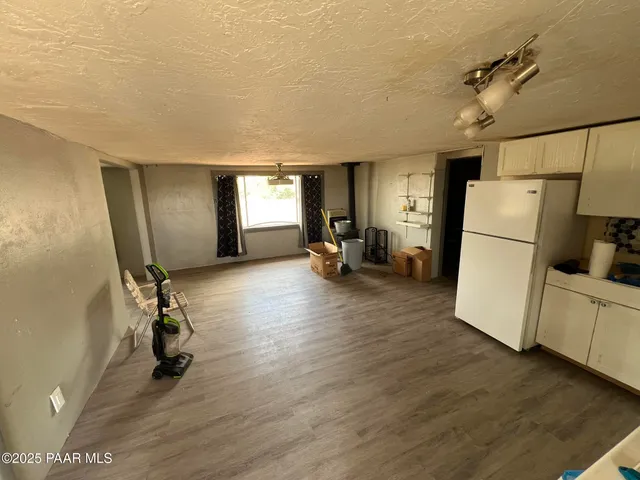 a bathroom with a toilet a sink and a shower
