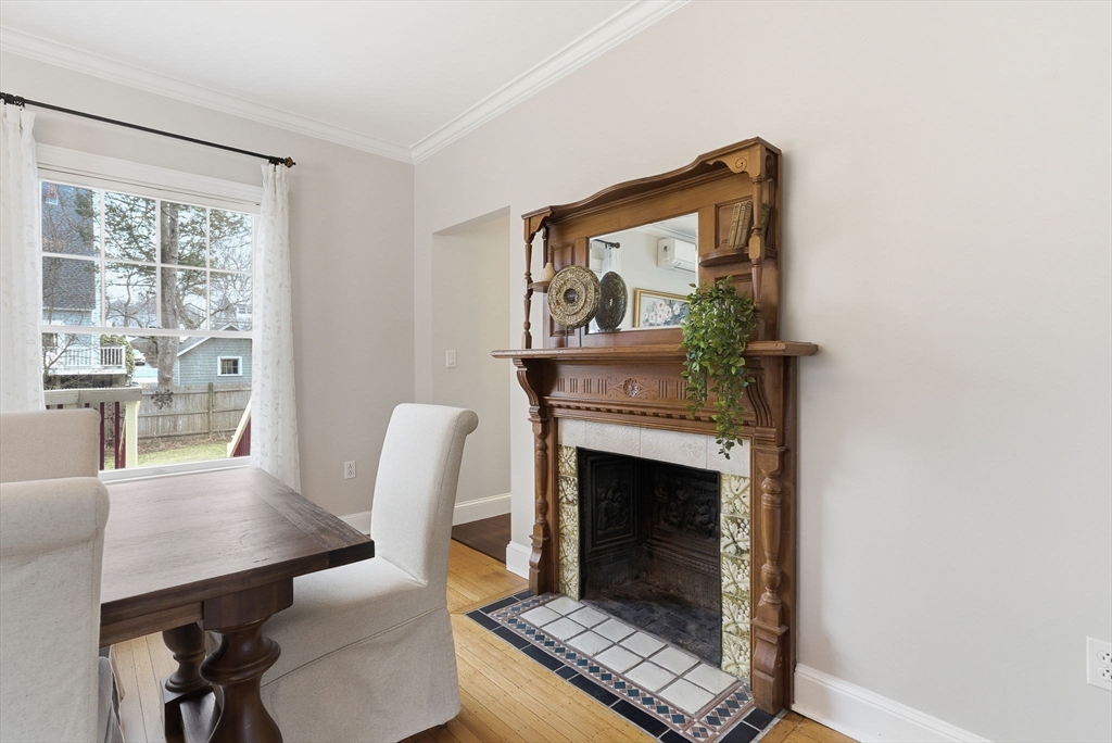 79 Florence Avenue Melrose, MA 02176 - Photo 7 of 35 a living room with furniture and a fireplace