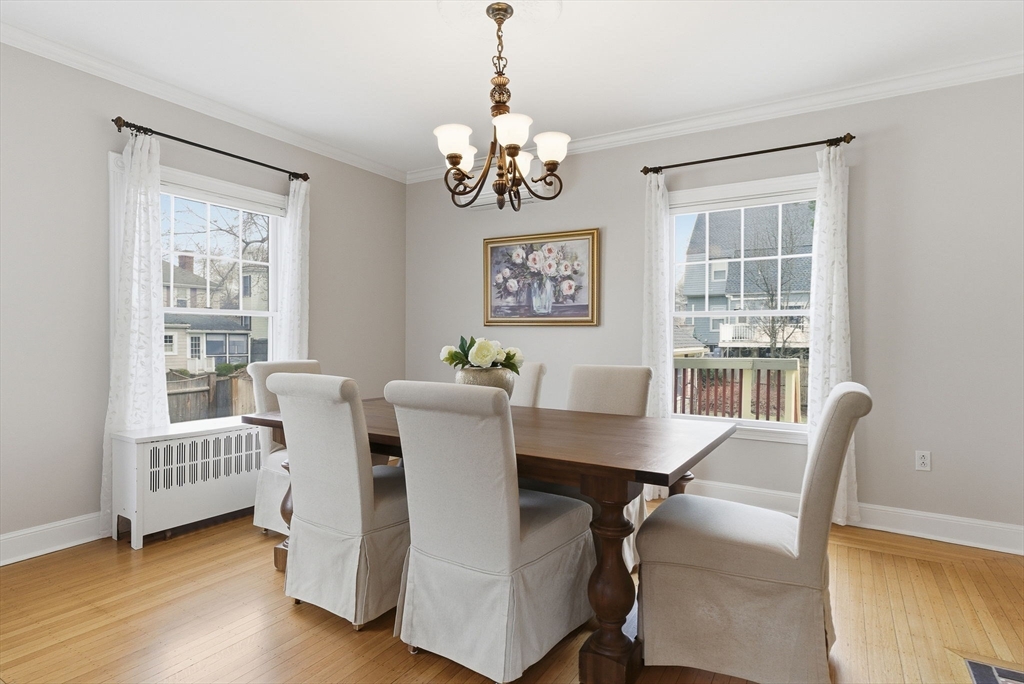 79 Florence Avenue Melrose, MA 02176 - Photo 8 of 35 a view of a dining room with furniture window and wooden floor