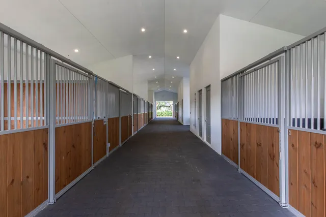 a view of a hallway with stairs
