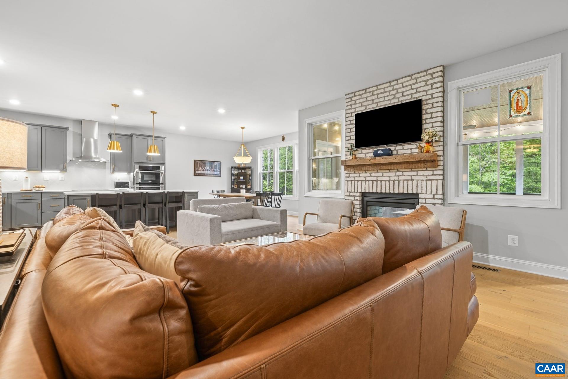 271 Two Rivers Drive Troy, VA 22974 - Photo 12 of 63 a living room with furniture and a flat screen tv
