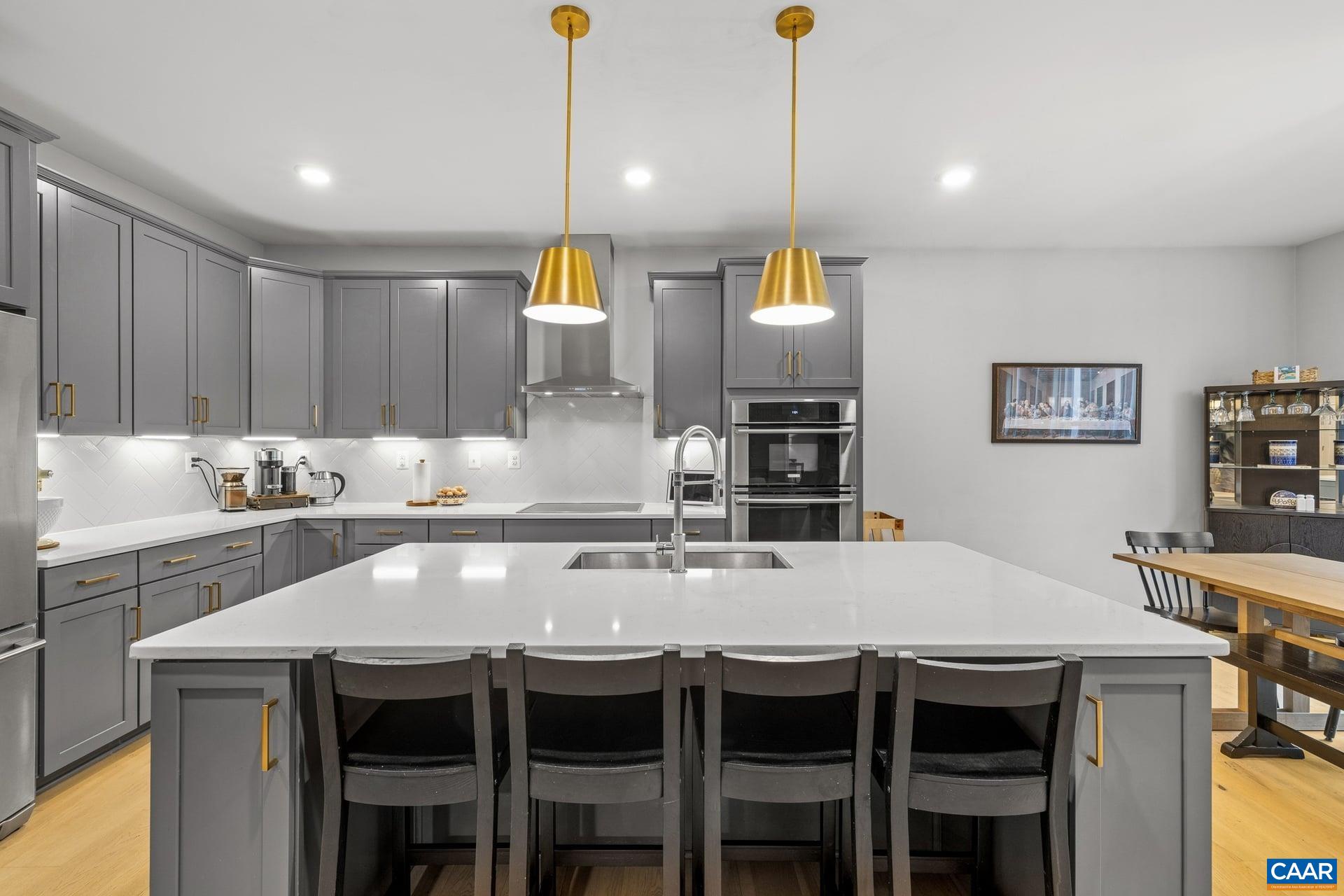 271 Two Rivers Drive Troy, VA 22974 - Photo 18 of 63 a large kitchen with a table and chairs