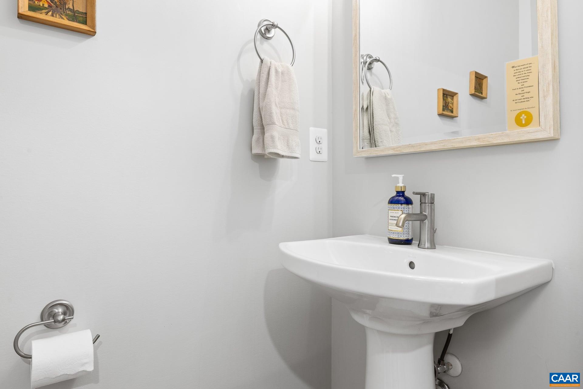 271 Two Rivers Drive Troy, VA 22974 - Photo 26 of 63 a bathroom with a sink and a mirror