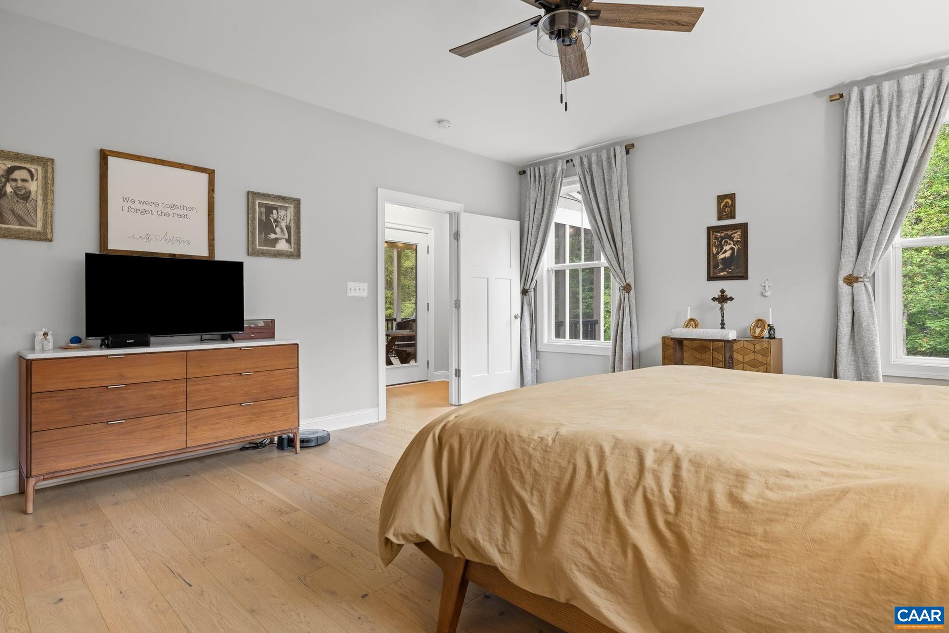 271 Two Rivers Drive Troy, VA 22974 - Photo 28 of 63 a bedroom with a bed and a flat screen tv