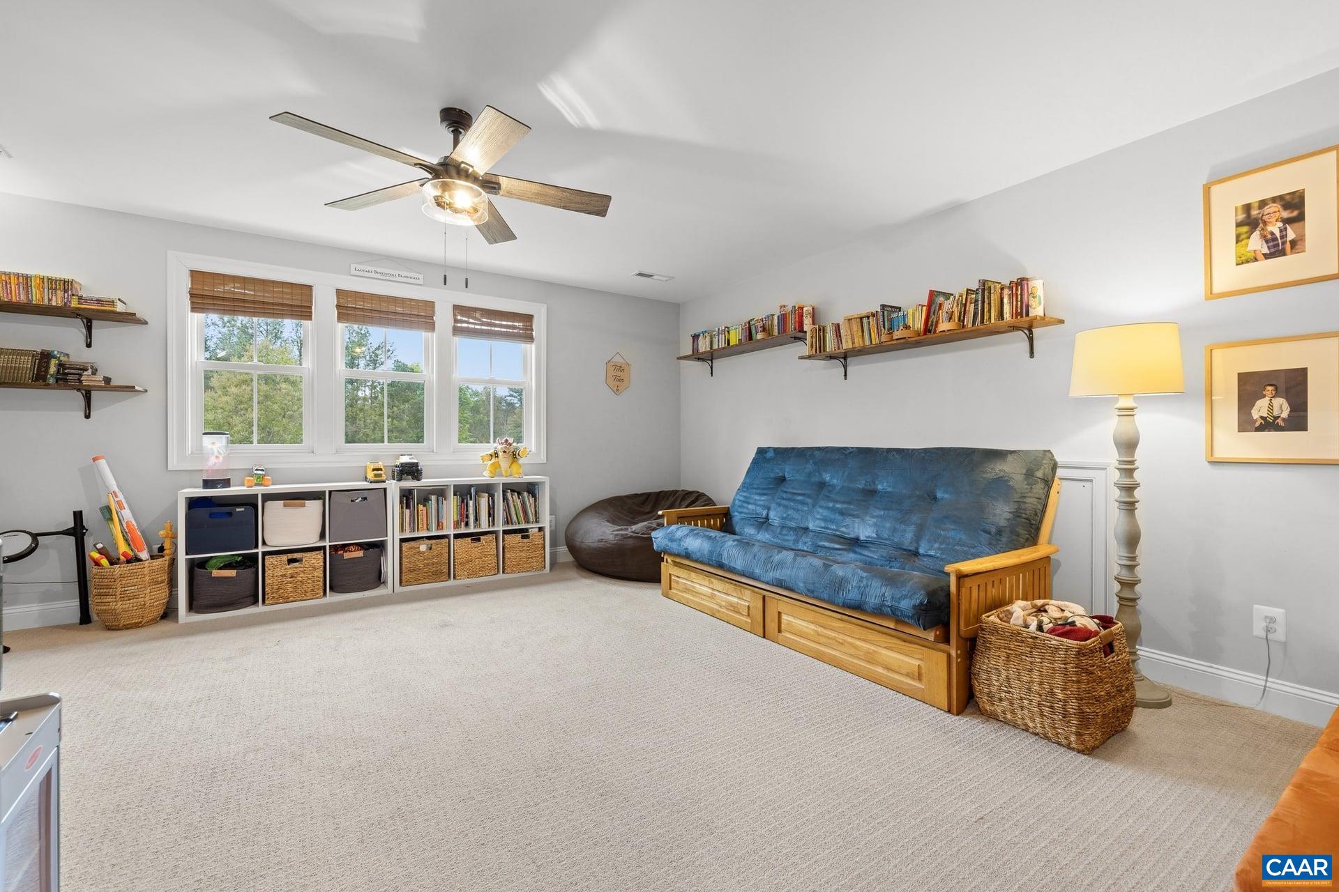 271 Two Rivers Drive Troy, VA 22974 - Photo 39 of 63 a living room with furniture and a large window