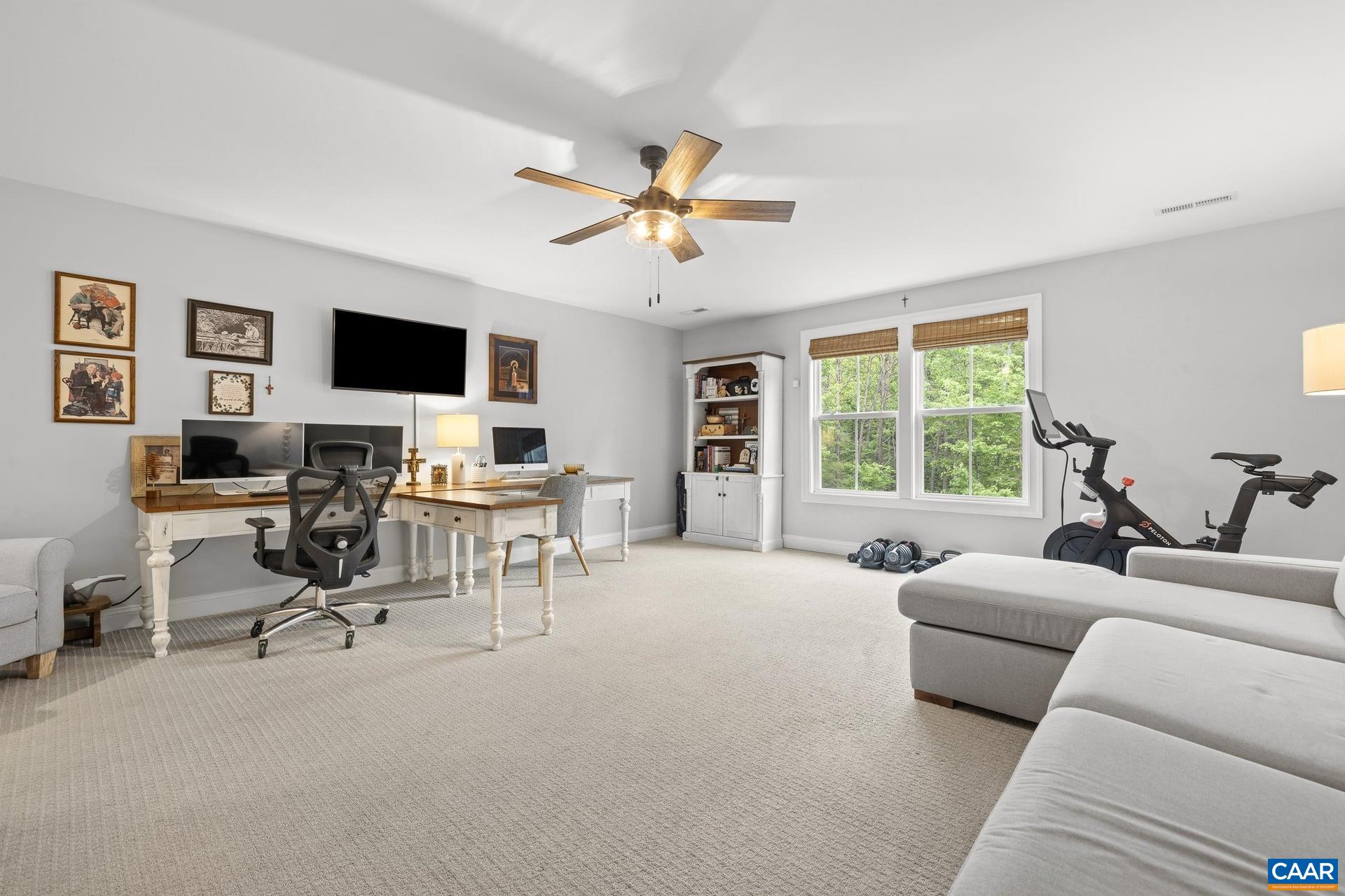 271 Two Rivers Drive Troy, VA 22974 - Photo 43 of 63 a living room with furniture and a flat screen tv