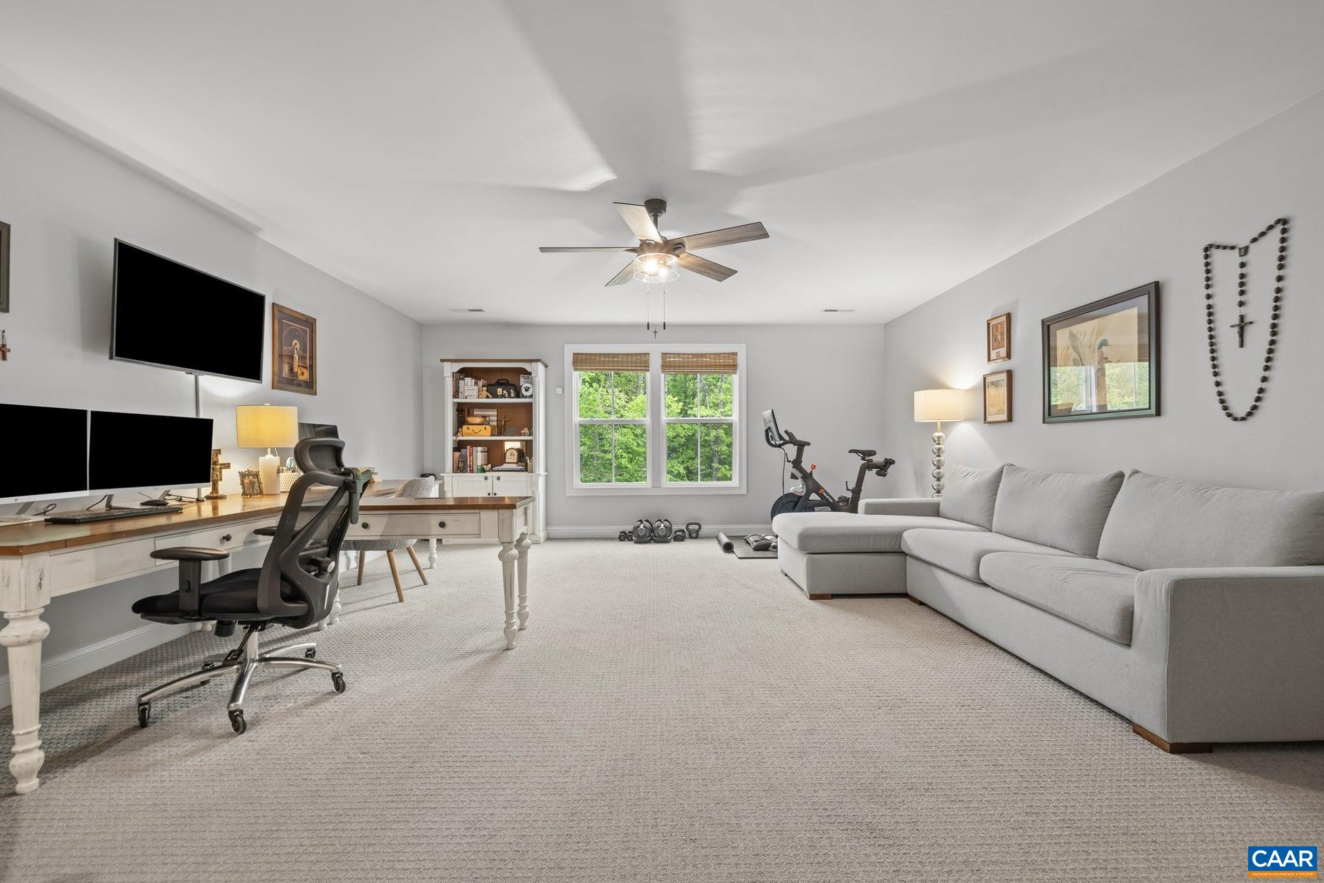 271 Two Rivers Drive Troy, VA 22974 - Photo 44 of 63 a living room with furniture and a flat screen tv