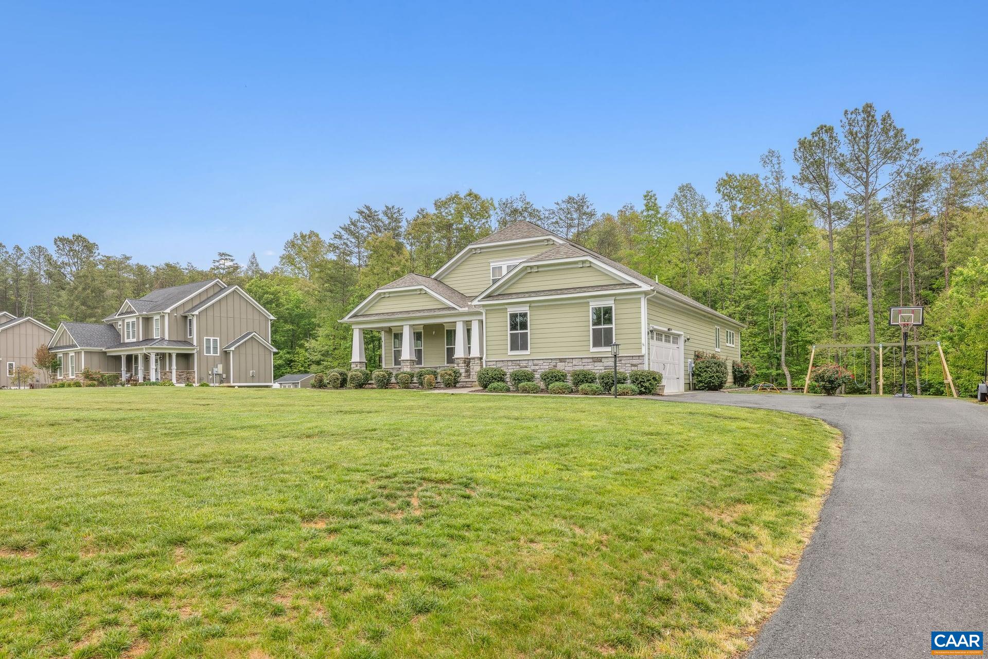 271 Two Rivers Drive Troy, VA 22974 - Photo 47 of 63 a front view of a house with a garden