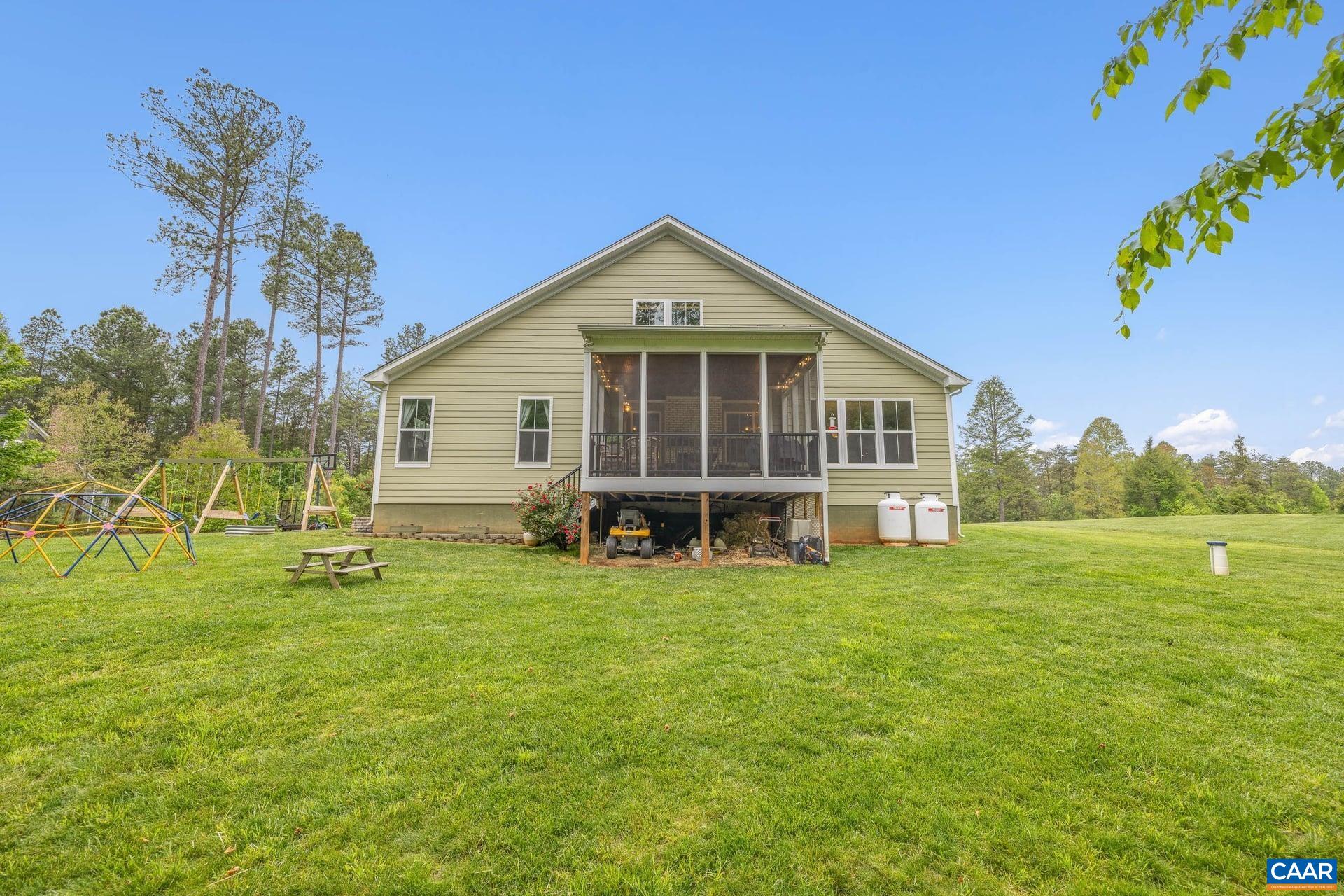 271 Two Rivers Drive Troy, VA 22974 - Photo 50 of 63 a view of a house with a yard