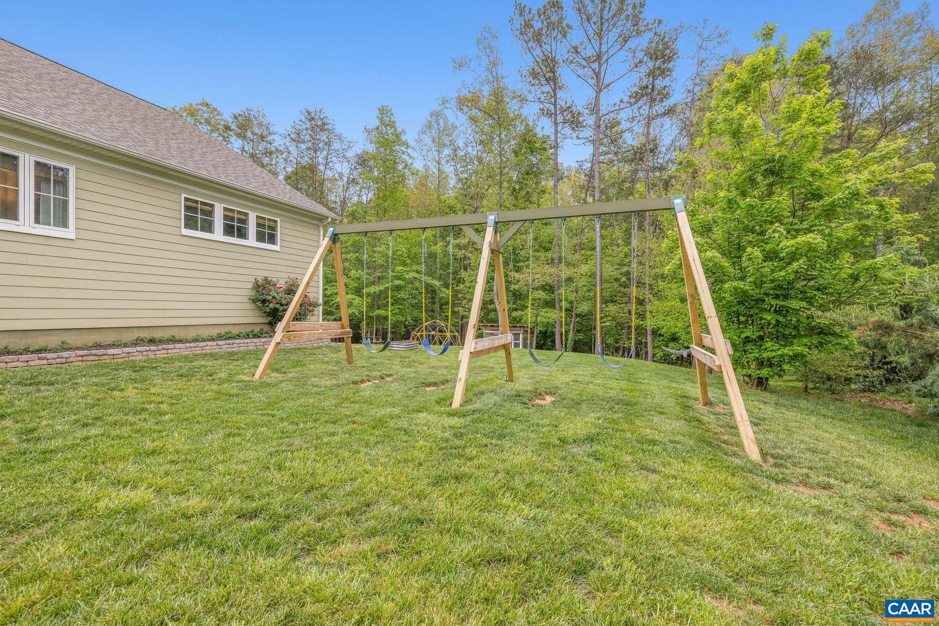 271 Two Rivers Drive Troy, VA 22974 - Photo 51 of 63 a backyard of a house with entertaining space