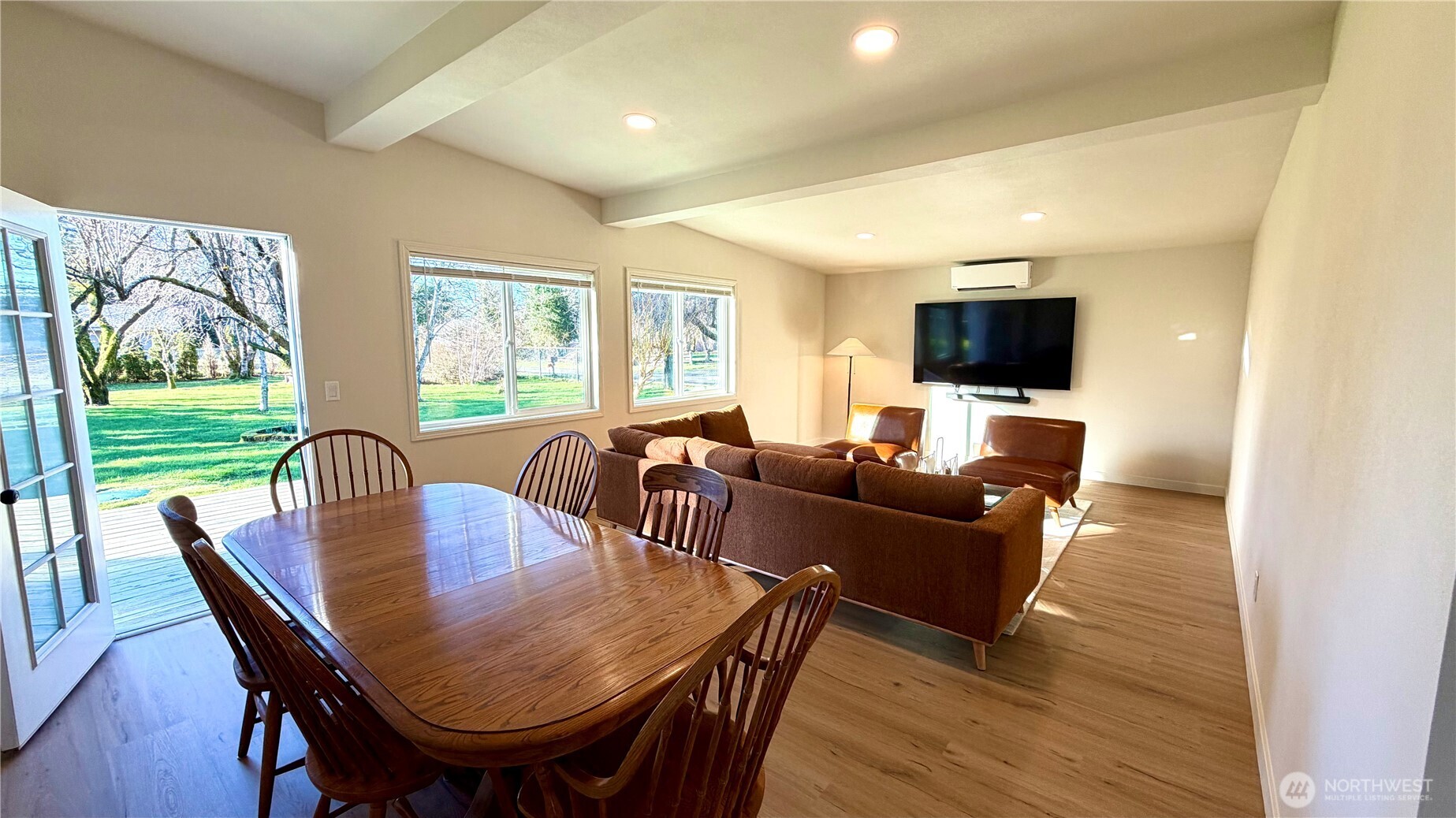 630 7th Avenue Forks, WA 98331 - Photo 5 of 39 a view of a dining room with furniture window and wooden floor