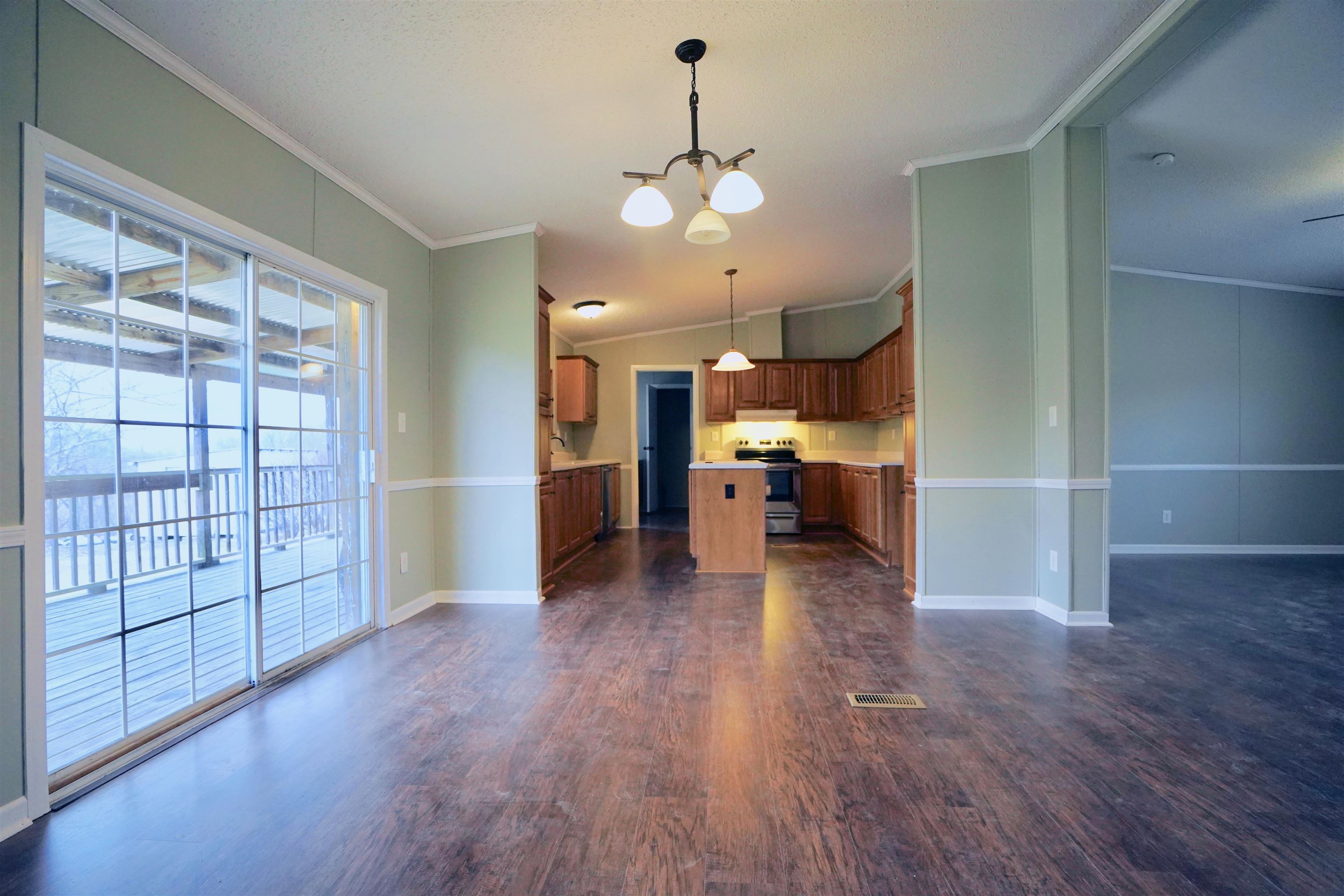 eat in area has sliding door to rear covered porch