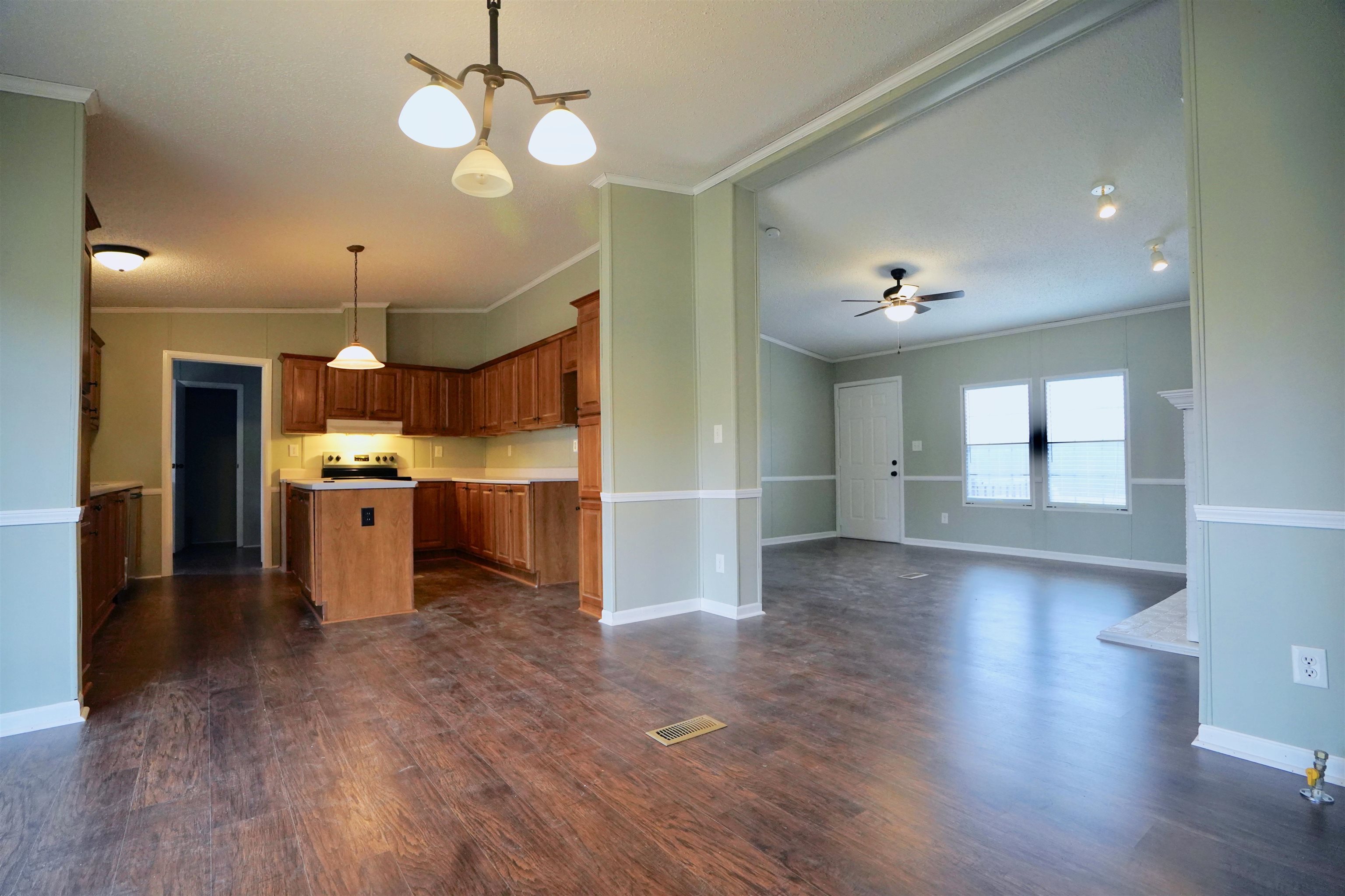eat in area open to living room kitchen and den areas