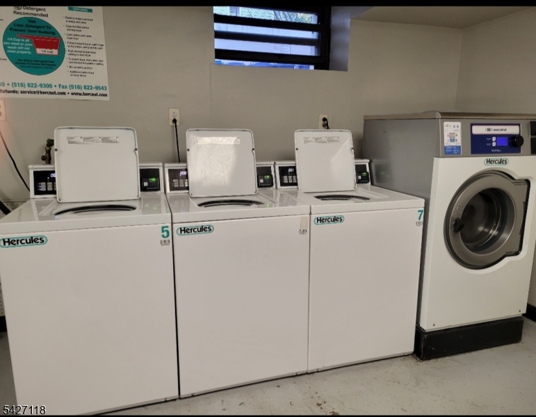 130 Orient Way, Unit 2K Rutherford, NJ 07070 - Photo 12 of 16 a utility room with dryer and washer