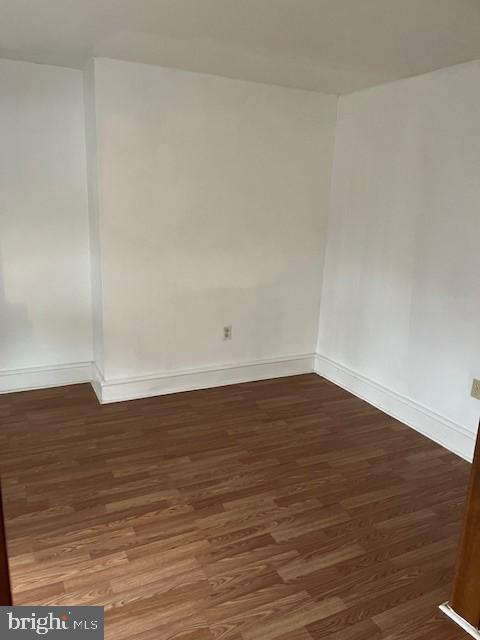 1001 Mount Laurel Road, Unit 5 Temple, PA 19560 - Photo 4 of 5 a view of an empty room and wooden floor