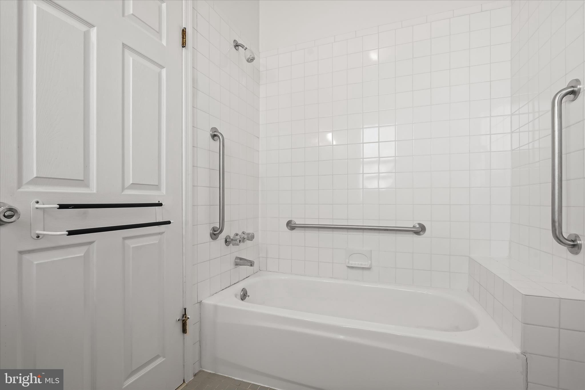 1342 Hamlin Street Northeast Washington, DC 20017 - Photo 16 of 32 a bathroom with a bathtub a toilet and a shower