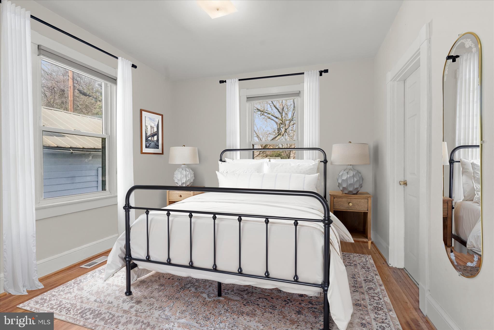 1342 Hamlin Street Northeast Washington, DC 20017 - Photo 17 of 32 a bedroom with a bed and a window