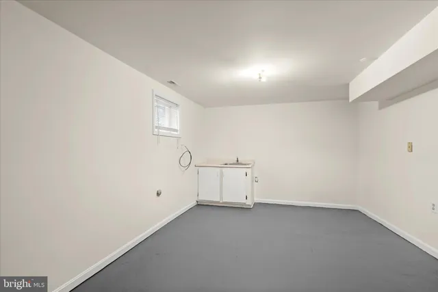 a view of balcony with wooden floor and fence