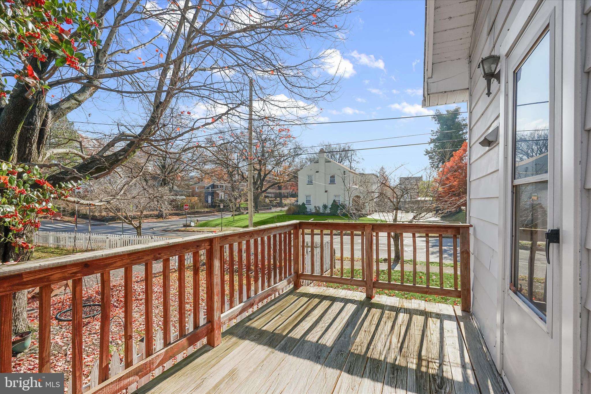 1342 Hamlin Street Northeast Washington, DC 20017 - Photo 26 of 32 a view of balcony with wooden floor and fence