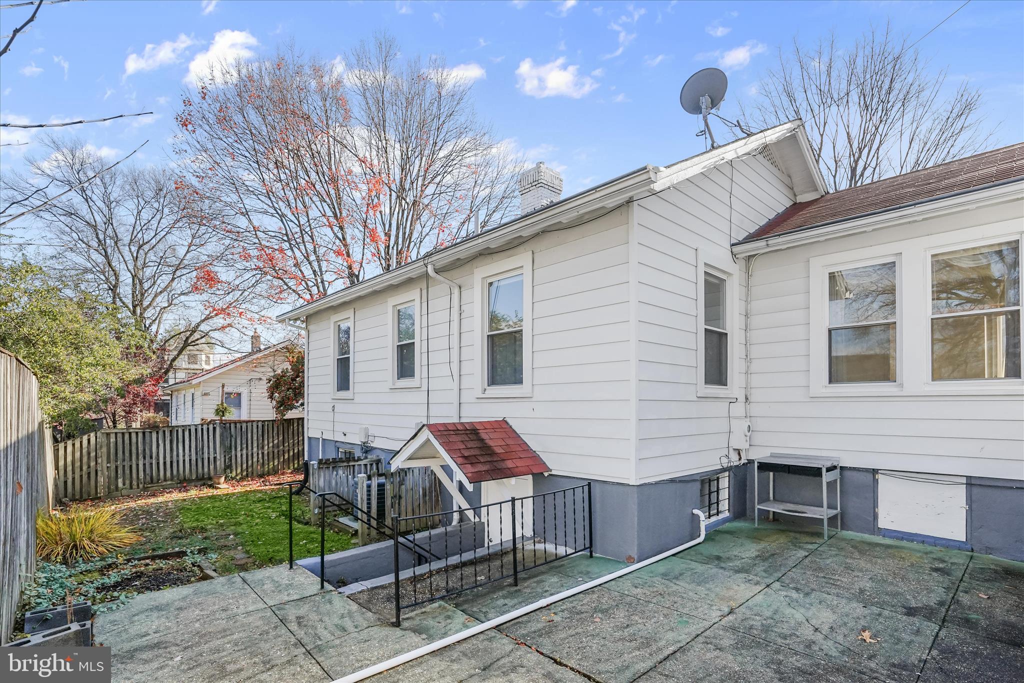 1342 Hamlin Street Northeast Washington, DC 20017 - Photo 27 of 32 a view of a house with a backyard