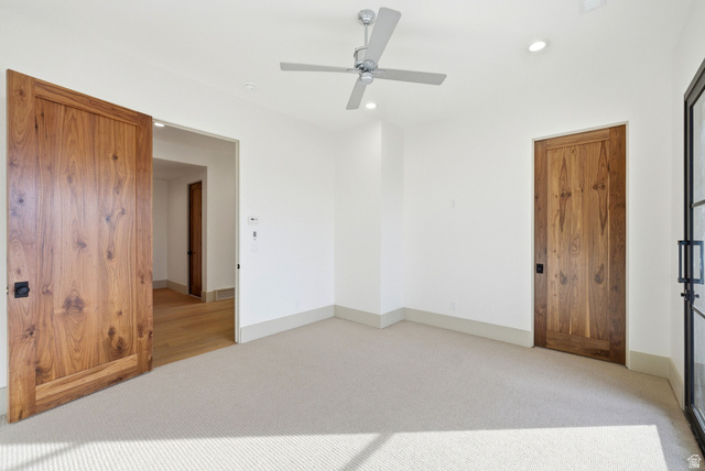 2155 East Wrangler Road Kamas, UT 84036 - Photo 21 of 62 Unfurnished bedroom with light carpet, ceiling fan, and recessed lighting