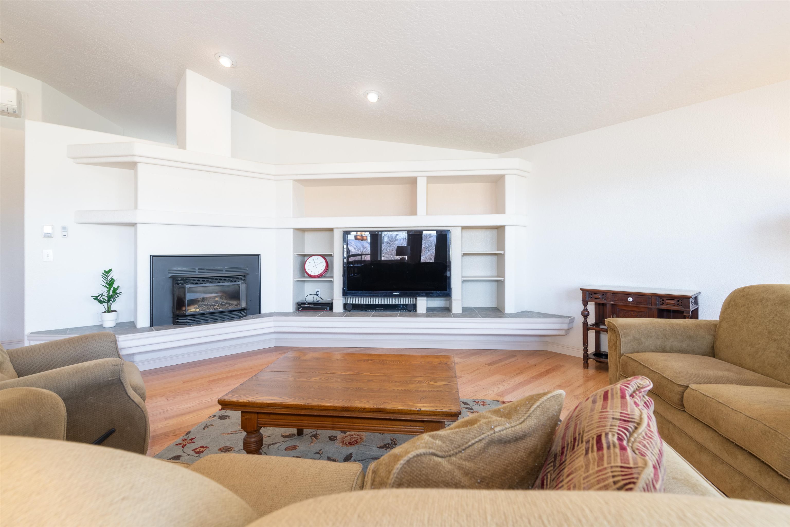 2120 I Road Grand Junction, CO 81505 - Photo 11 of 42 a living room with furniture and a fireplace