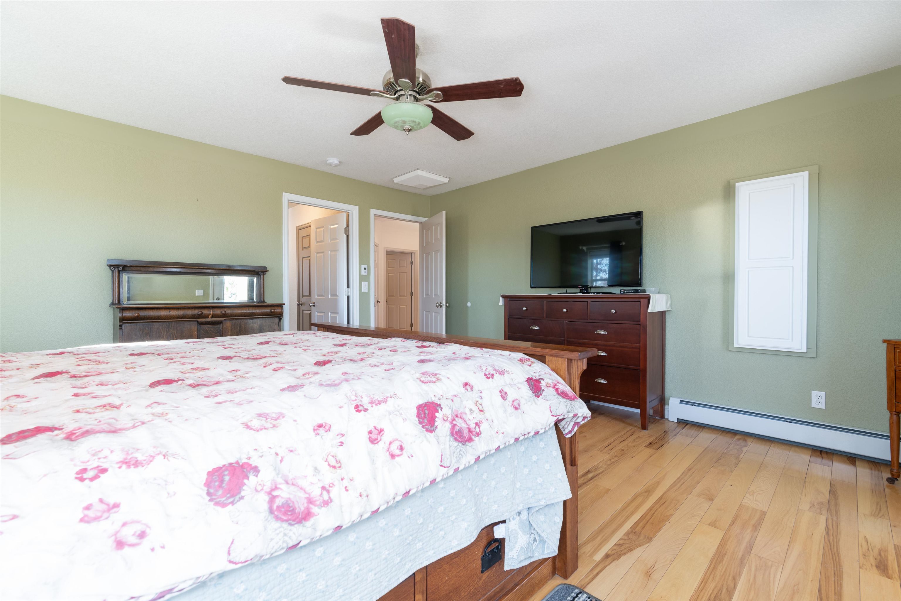 2120 I Road Grand Junction, CO 81505 - Photo 13 of 42 a bedroom with a bed and a dresser