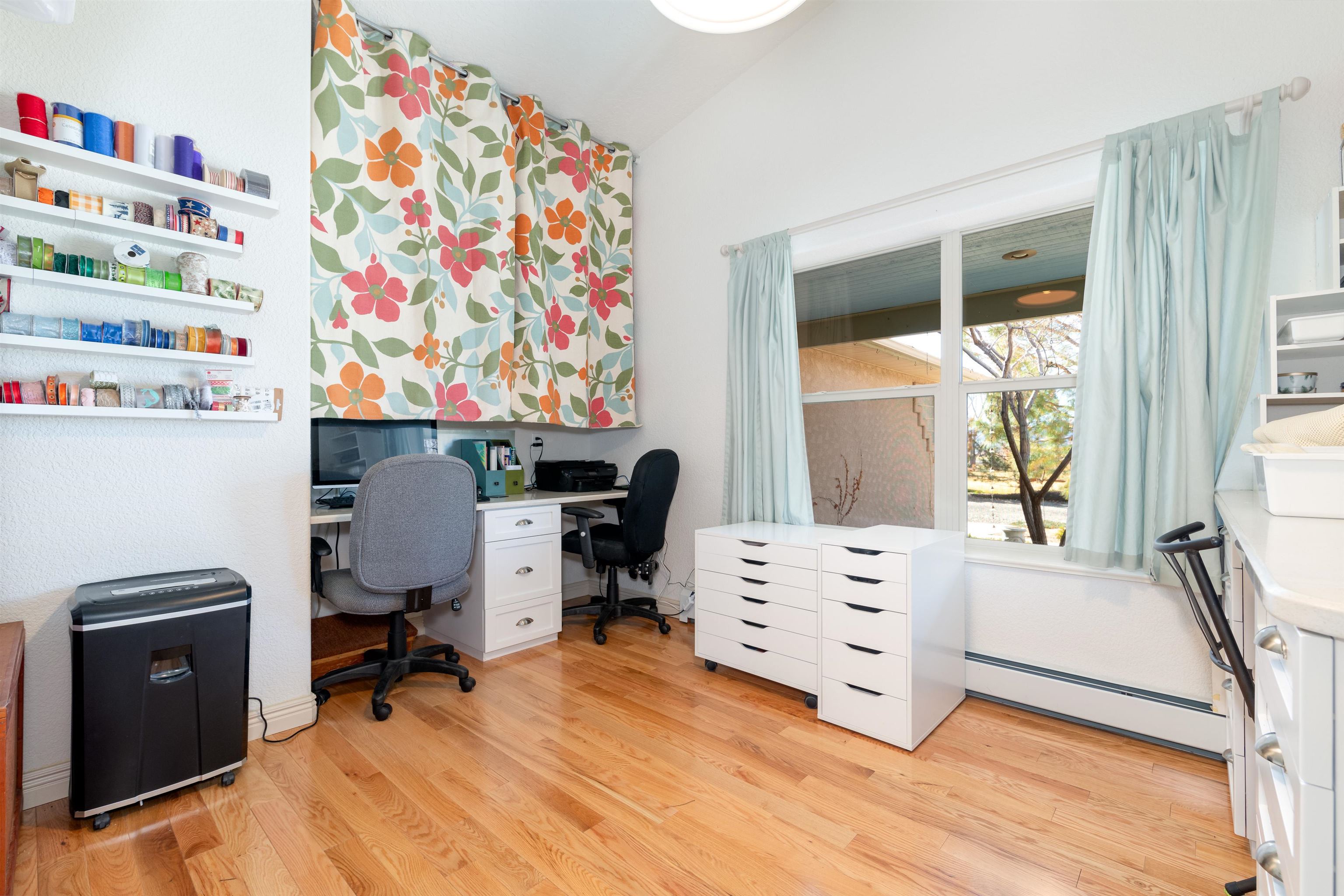 2120 I Road Grand Junction, CO 81505 - Photo 19 of 42 a view of a workspace with furniture and a window