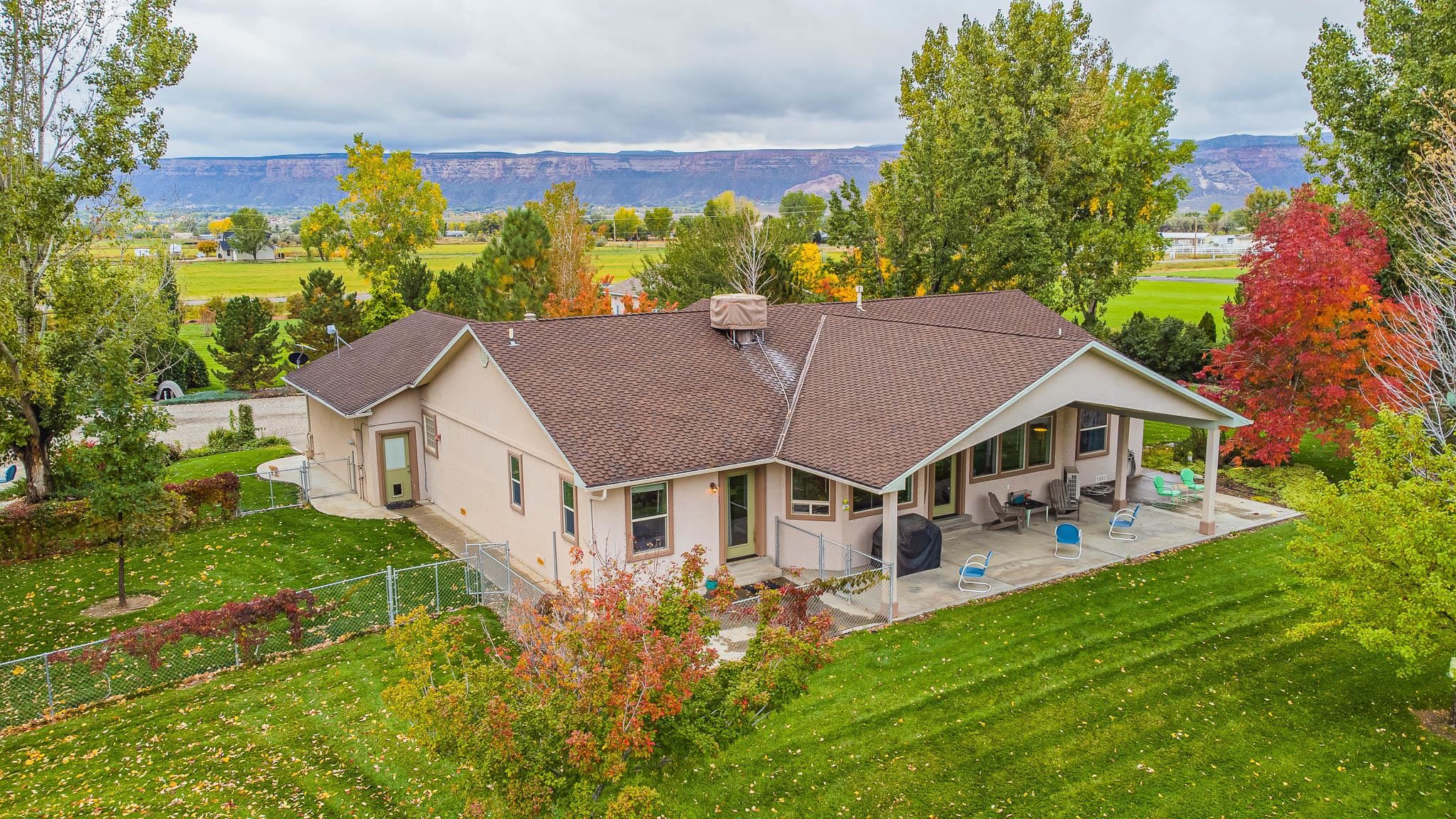 2120 I Road Grand Junction, CO 81505 - Photo 35 of 42 a aerial view of a house with yard porch and furniture