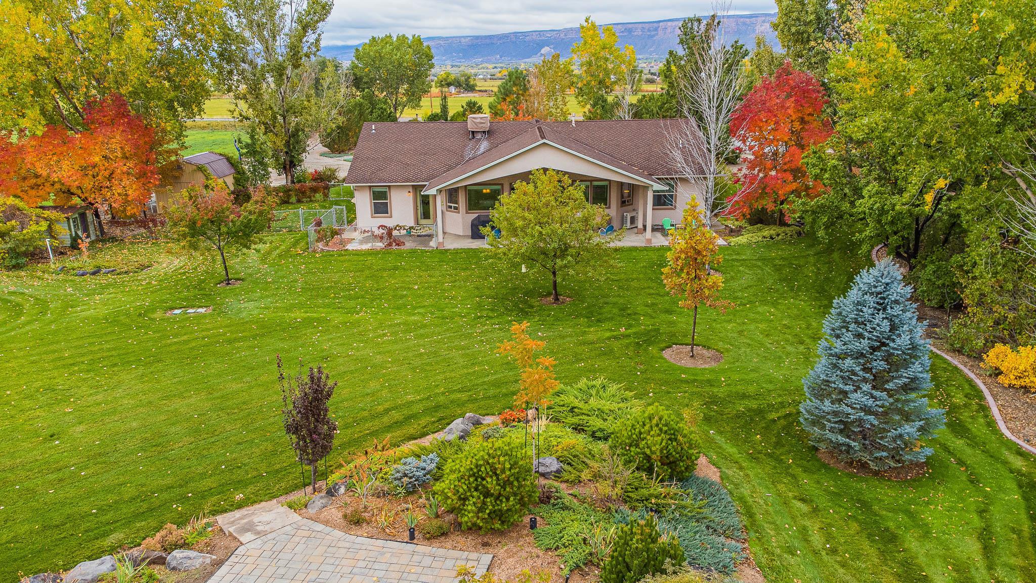 2120 I Road Grand Junction, CO 81505 - Photo 36 of 42 a front view of house with yard and green space