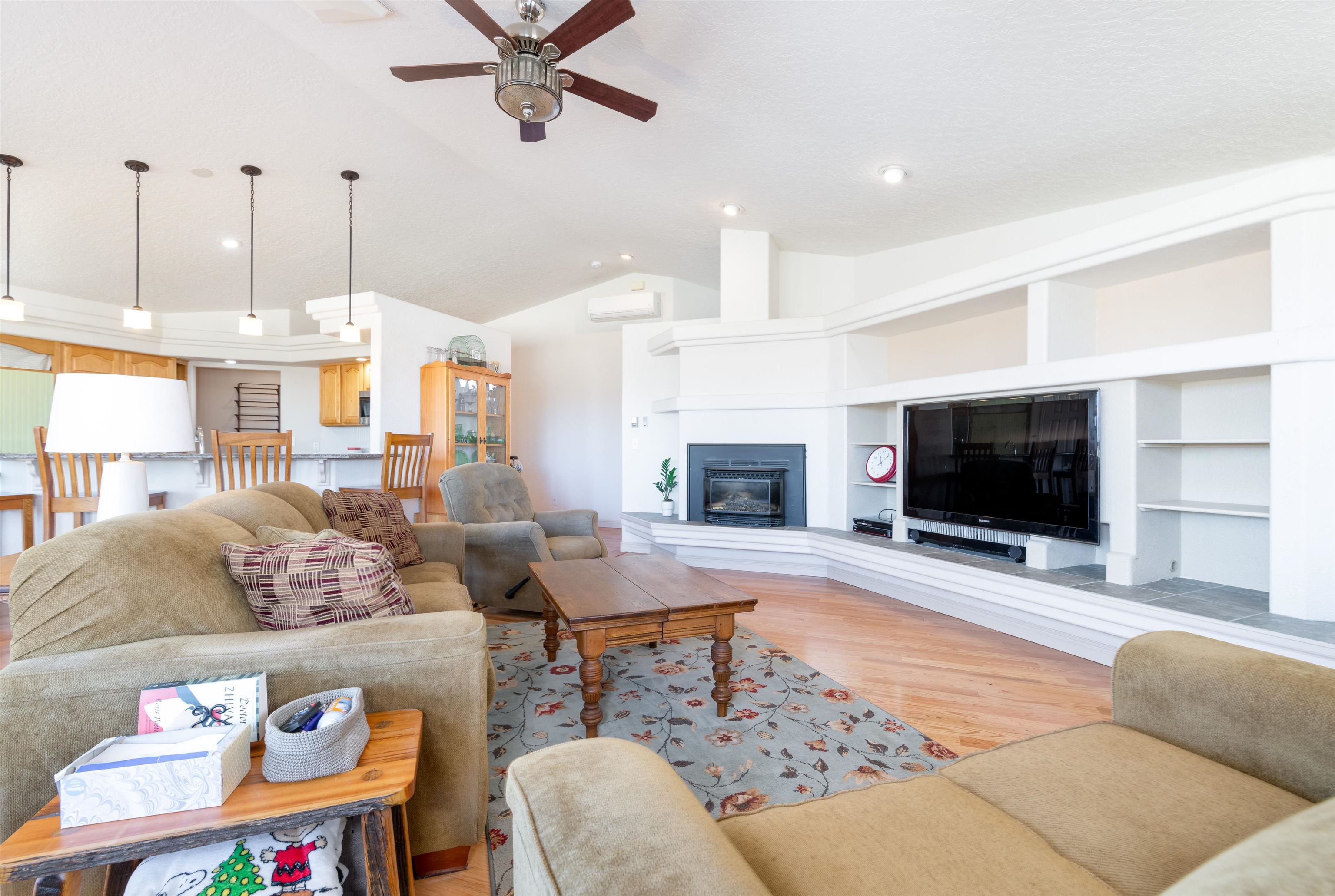 2120 I Road Grand Junction, CO 81505 - Photo 10 of 42 a living room with furniture and a flat screen tv