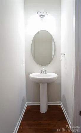 a bathroom with a sink toilet