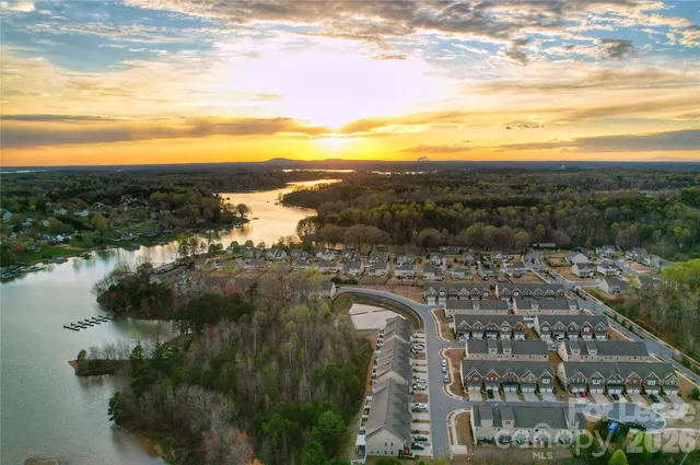 a view of a lake with a city
