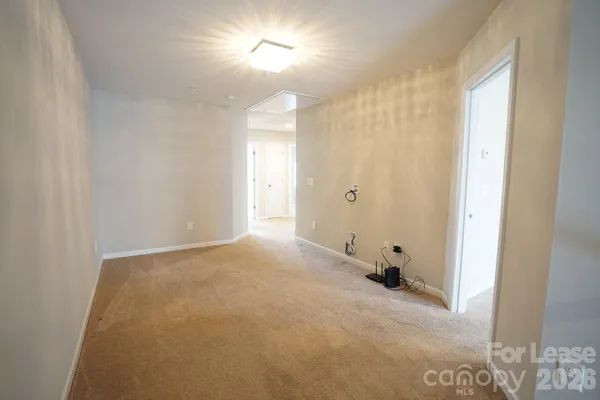 a view of a room with a window