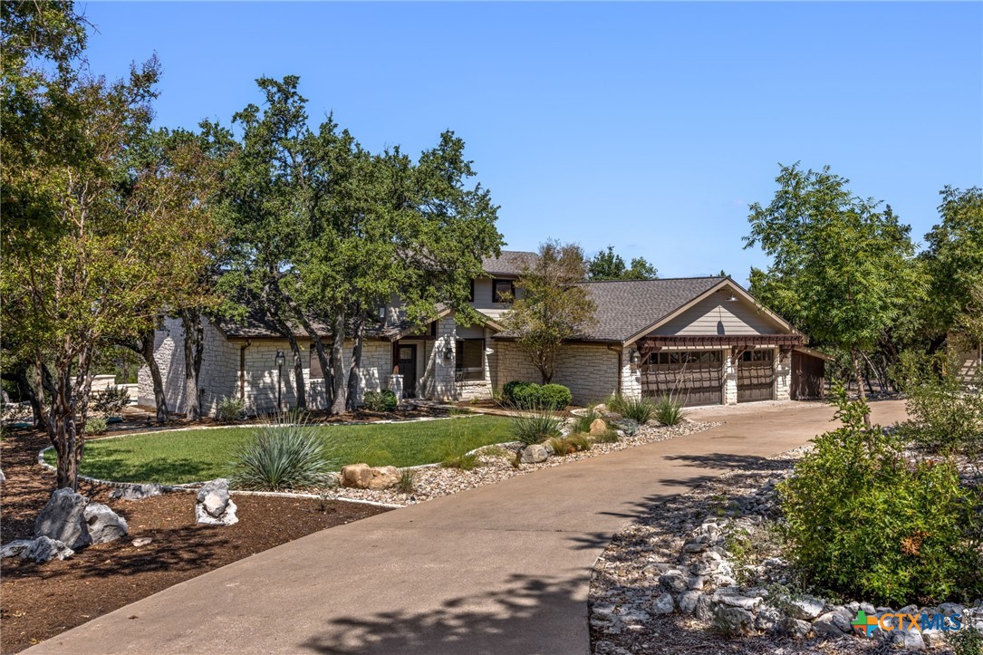 17810 North Rim Drive Leander, TX 78641 - Photo 1 of 1 front view of a house with a yard