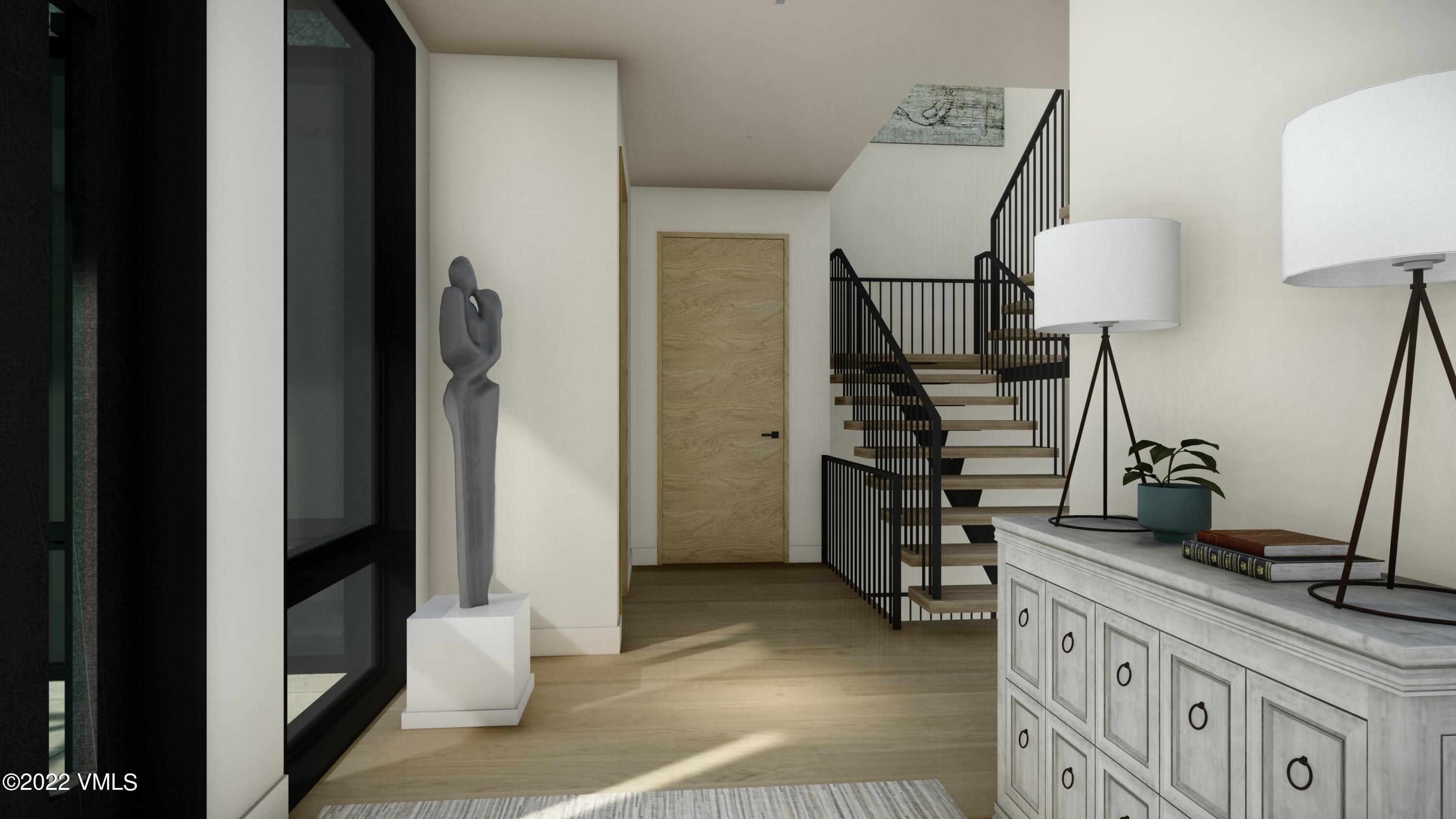 2965 Manns Ranch Road Vail, CO 81657 - Photo 11 of 26 a very nice looking room with a chair