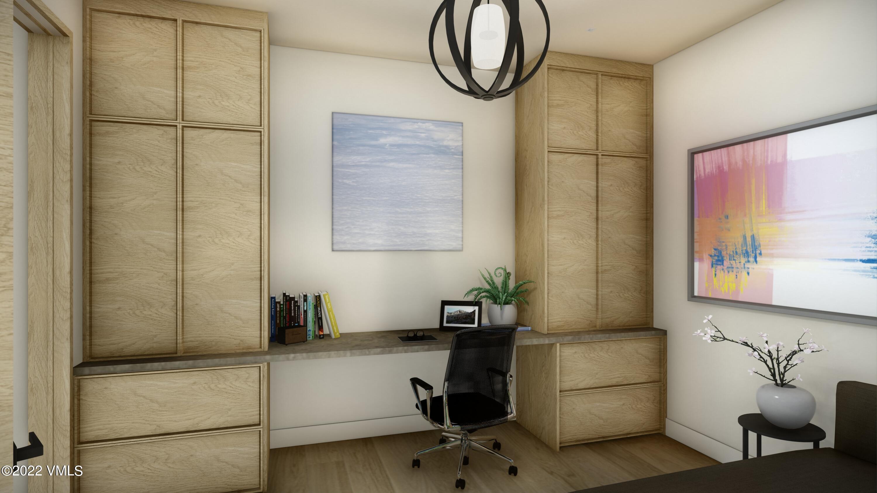 2965 Manns Ranch Road Vail, CO 81657 - Photo 14 of 26 a room with a table and a chair