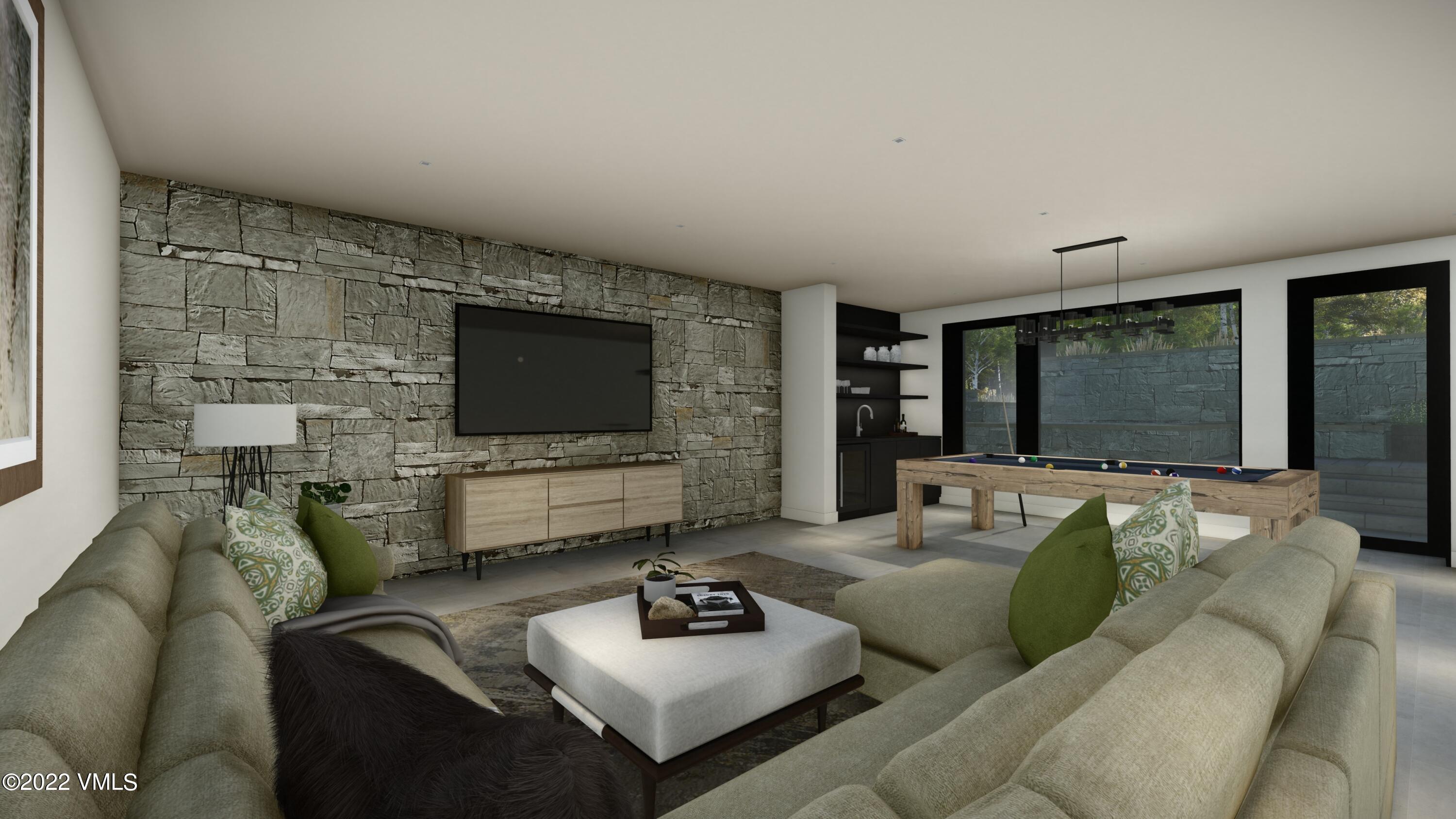 2965 Manns Ranch Road Vail, CO 81657 - Photo 18 of 26 a living room with furniture and a flat screen tv